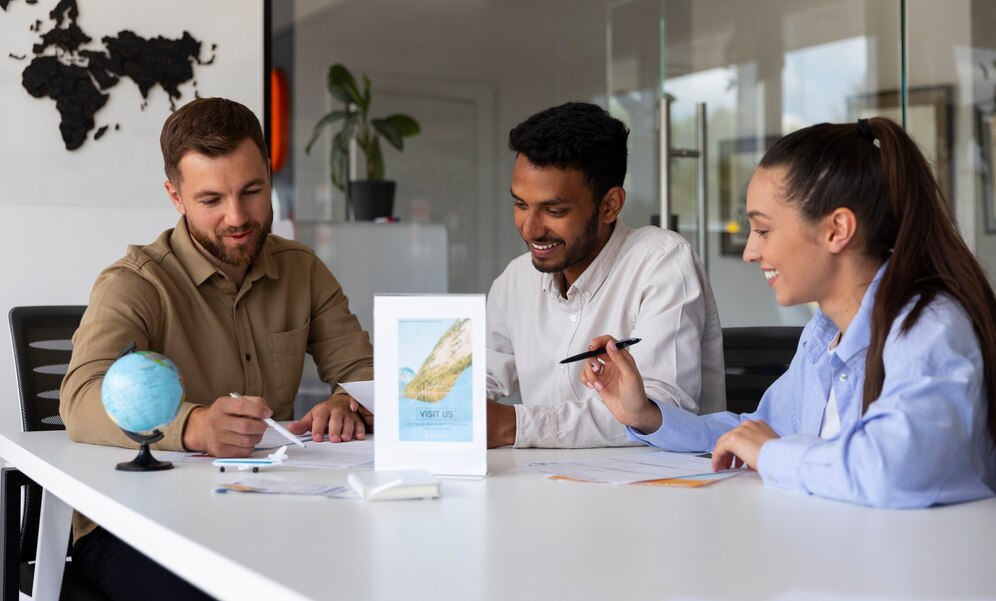 Three professionals discuss financial documents, focusing on British Virgin Islands taxation.