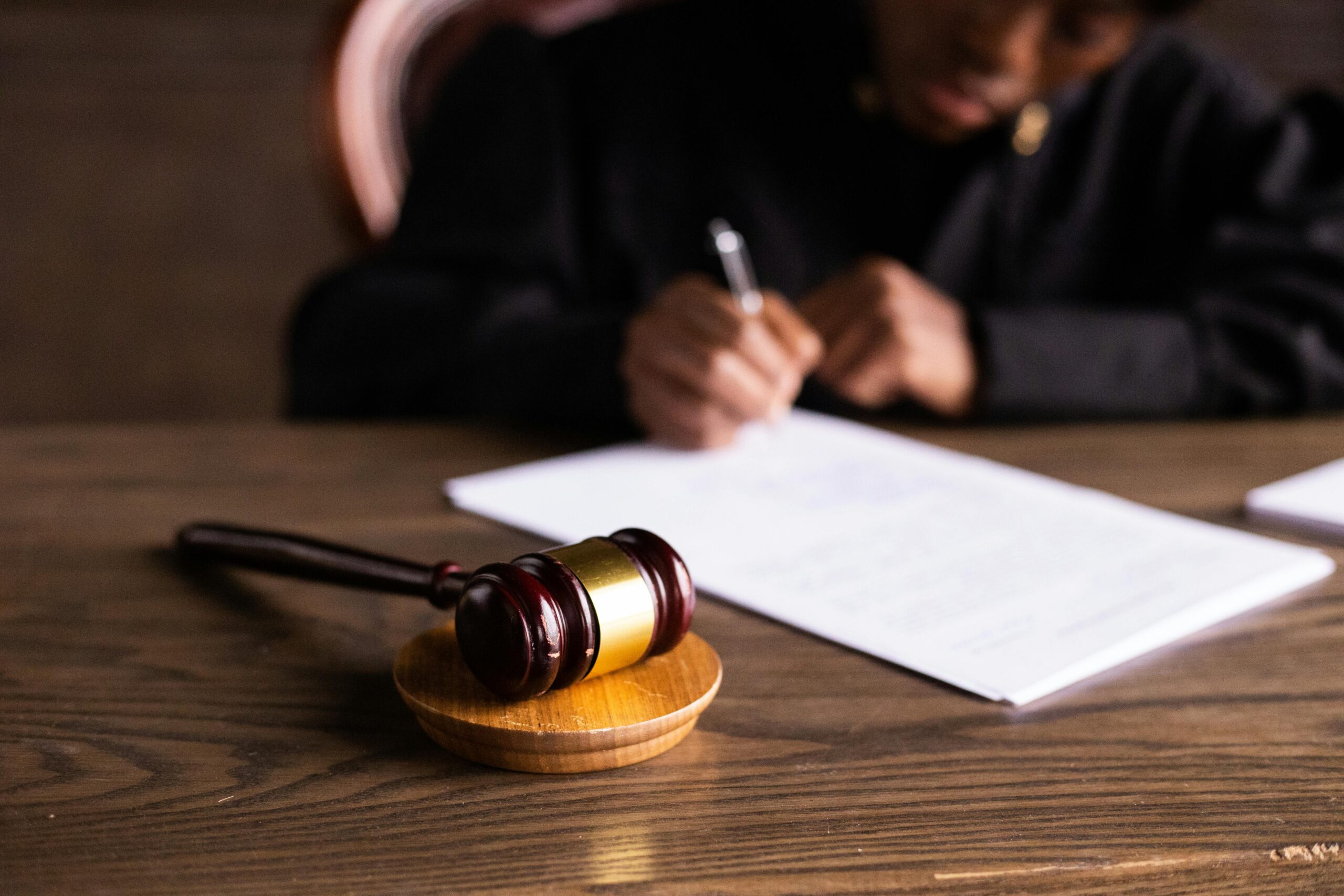 Gavel on wooden block, legal document in background, relating to the 12-Month Time Limit to Contest a Will in New South Wales.